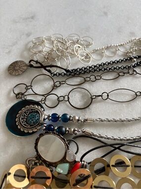 6 Boho necklaces, chains, stones,etc. All are in excellent condition.